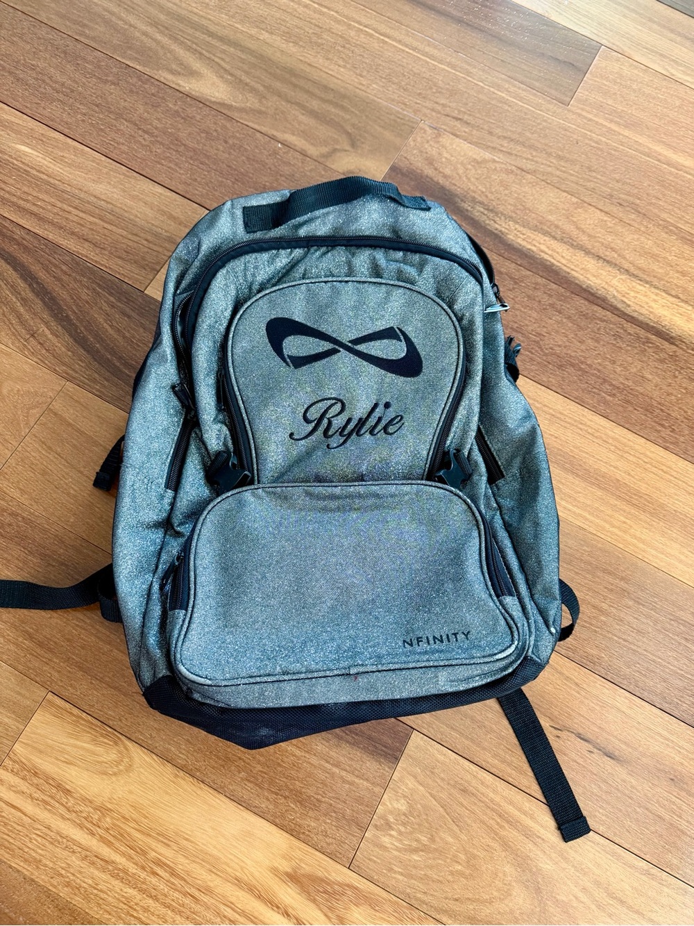 NFINITY sparkle Silver Women's Backpack with Black Logo Accent  name Rylie